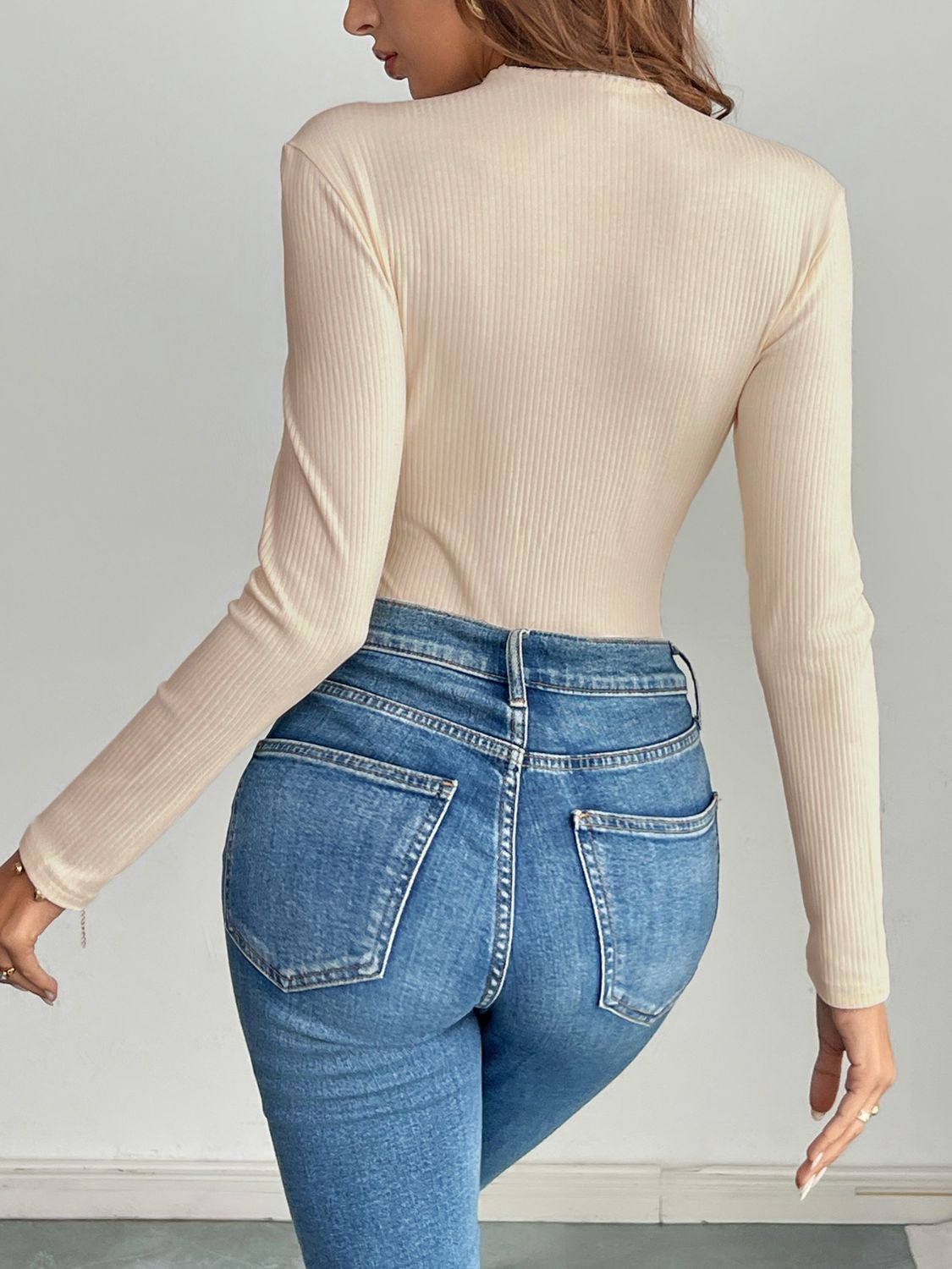 Perfee Decorative Button Round Neck Long Sleeve Bodysuit